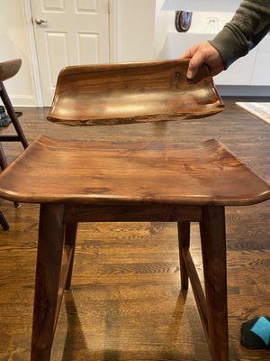 BEFORE: Sloped back of stool broken completely off.