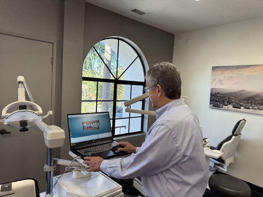 Dr. Flores working on a digital case