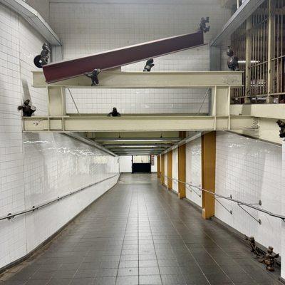 14th St-8th Ave Subway Station (A,C,E,L) - Tom Otterness "Life Underground" 2001, construction people, L Ramp