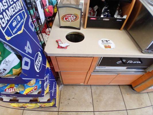 Counter where you apply condiments to the hot dog. First off who puts ketchup on a hot dog?
Floor dirty