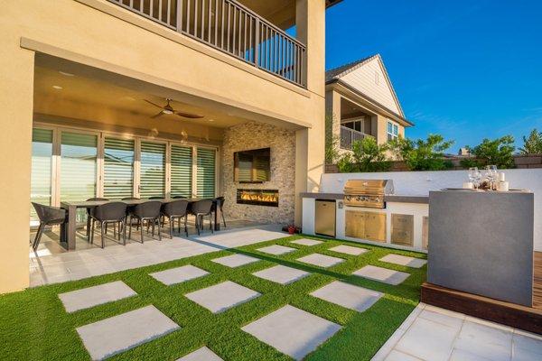 Contemporary Patio w/ BBQ, Dining Area, and Fireplace