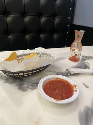 Great nachos and salsa. Good kick to the salsa.