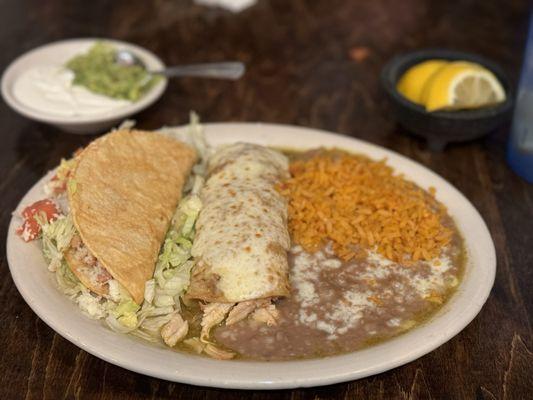 Chicken taco & chicken enchilada with green sauce.