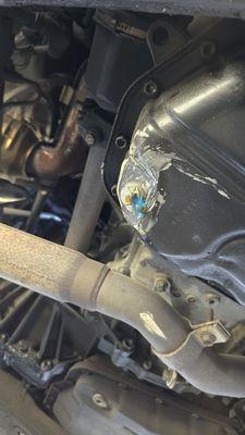 Leaking oil pan that Pepboys tried to fix with RTV