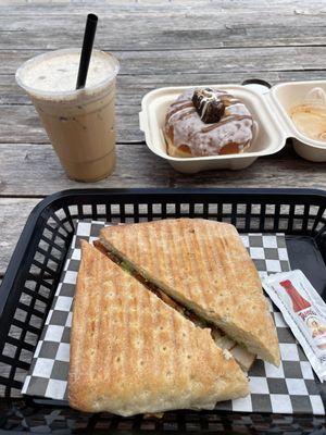 Turkey pesto panini, a seasonal cold brew coffee (can't remember which one), and a snickers donut!