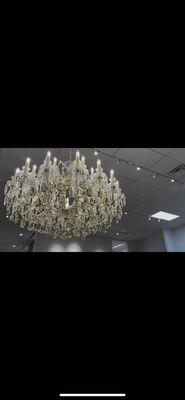 Installation of fixture with over 1300 crystals to dress.