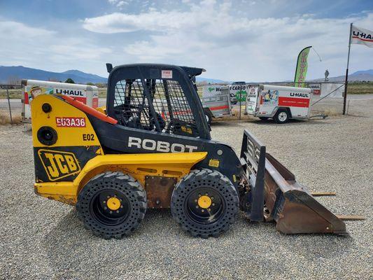 Skid Steer with many Attachments for Rent