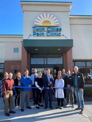 Group photo during ribbon cutting celebration at Twin Cities Pain Clinic in Maplewood, MN
