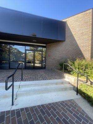 Front of the building. They have free parking in the lot