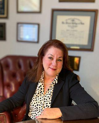 Lorrie hard at work behind her desk.