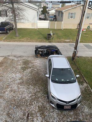 There it is...sitting at the end of my driveway, blocking my road. Can't be lifted without forklift.