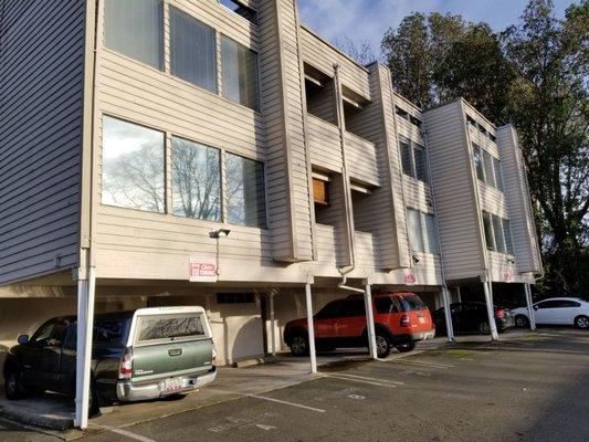 Outside photo of the faded falling apart building