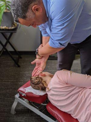 Dr. Zepeda performing upper cervical spine adjustment