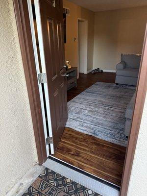 Unlocked apartment door.