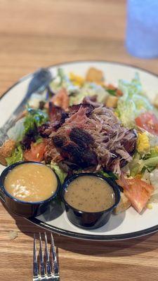 Pulled pork bbq sandwich delicious! With the honey mustard and house made vinegarette, honey mustard was good