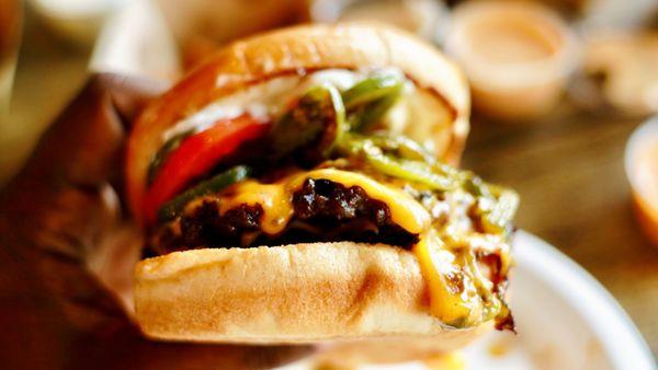 Classic Double Cheeseburger with cheddar, japs, mayo, tomato and pickles. (Burger was not seasoned at all lacked flavor )