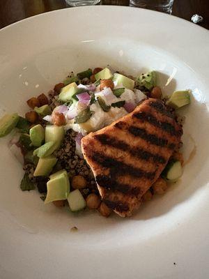 Mediterranean quinoa grain bowl with added salmon