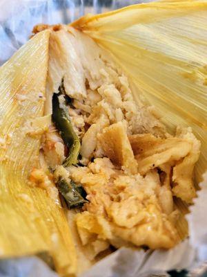 Veggie tamale. Had the chicken and pork tamale in the car but didn't capture a photo. All were delicious. Soft and tasty masa and fillings!