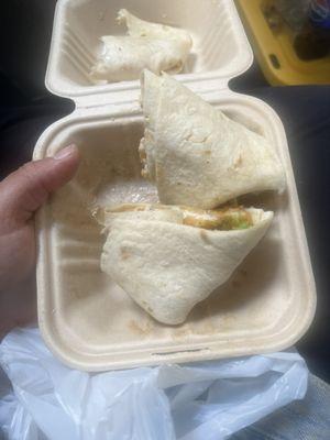 Breaded chicken wrap with lettuce , tomato( not on there ) and avocado.