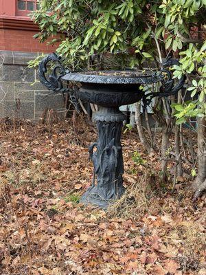 Outside bird fountain.