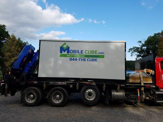MobileCube storage cube on a truck in Prineville -- fast, reliable delivery for moving and long-term storage needs.
