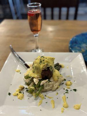 Filet Oscar. Filet Mignon topped with lump crabmeat and a nice bernaise sauce over asparagus