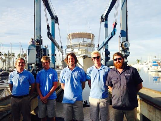 The Bryson Marine crew launching a 33' Tiara after bottom paint and prop tune up.