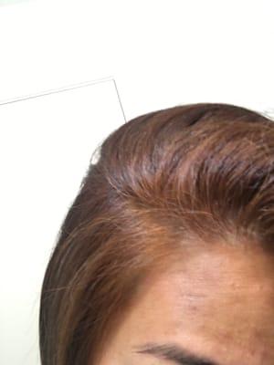 light brown roots with orange-ish spots. The rest of my hair is dark brown