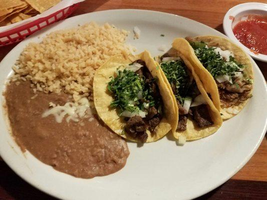 2 Carne asada and 1 carnitas taco. Yum!