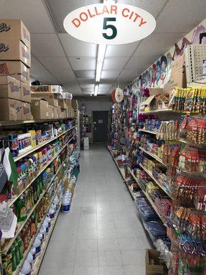 Household cleaning items, party gift bags, foil paper, ziplock bags.