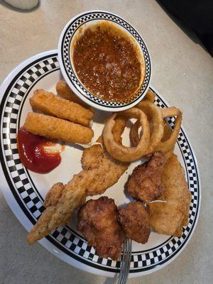 Appetizer sampler with a delicious meat sauce