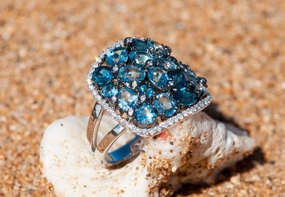 Blue Topaz gemstone beach pebble ring with fine diamonds in 14k white gold.