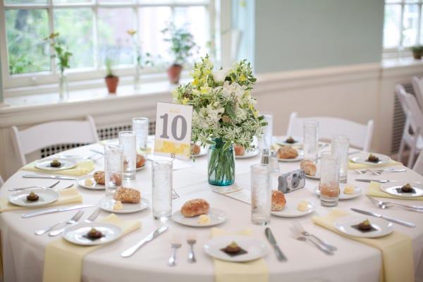 table setting at colonial dames venue; florals by jenny at love n fresh flowers