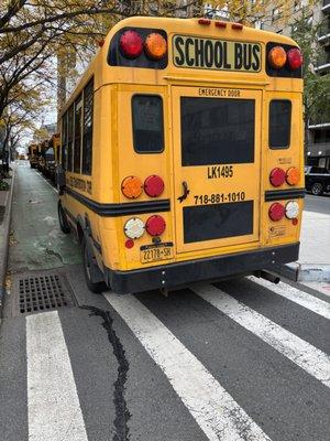 Lessell bus parked over bike lane no driver 1 of 3 buses blocking lane. Legal parking nearby was available