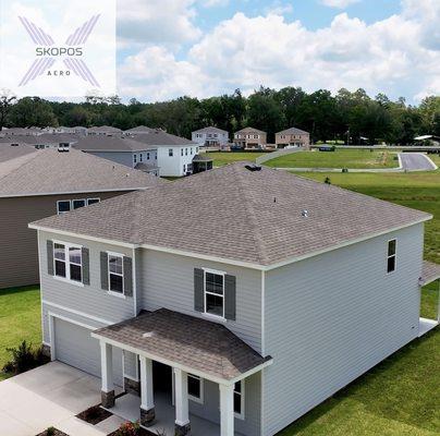 Aerial photograph of model home.