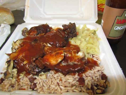 jerk chicken, "rice and peas", and spicy cabbage