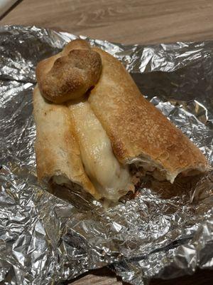 Pizza roll with sausage.