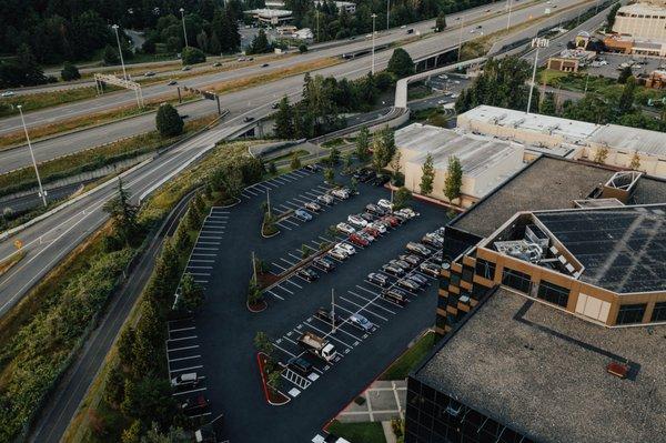 After asphalt repairs, sealcoating and striping!