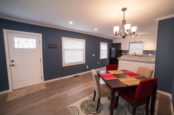 Additional light fixtures were added to the dining room and kitchen to make the space feel bright.