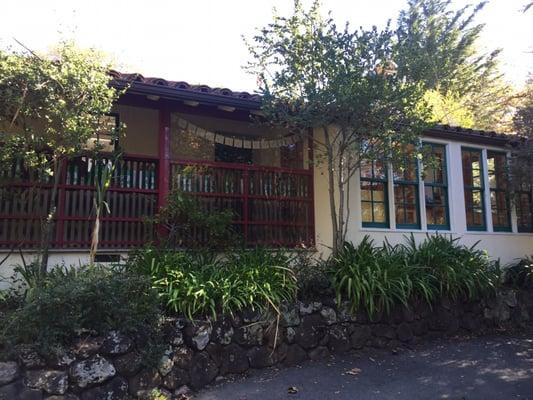 A charming school in a park-like setting.