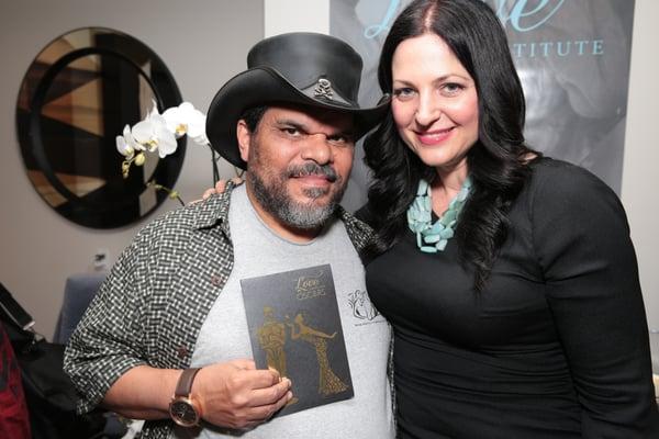 Actor Luis Guzman and Meagan Holub, Celebrity Massage Therapist and Fonder of The Love Institute at The Oscars Gift Suite.
