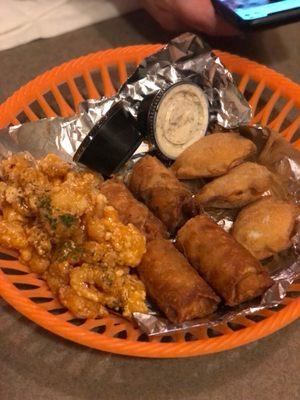 Combo appetizer ,Locked N loaded shrimp (Amazing) Crawfish pie,Southwest egg rolls. Came with ranch and spinach dip sauce