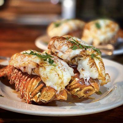 Cold water South African lobster tail served with drawn butter and lemon.