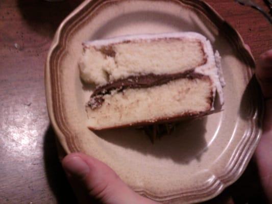 Vanilla cake with chocolate ganache filling and fondant frosting