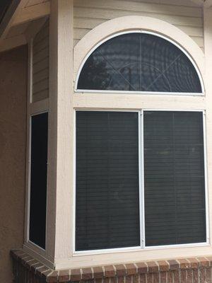 Solar screens with a custom 1/2 circle solar screen.