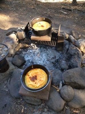 Cooking in cast iron while camping is fun. Cast iron is as good at camp as at home.