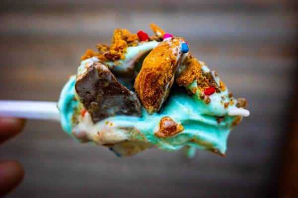 Blue moon with butterfinger and rainbow sprinkles.