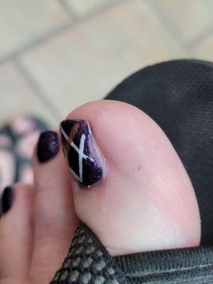 My big toe with paint not completely done.
