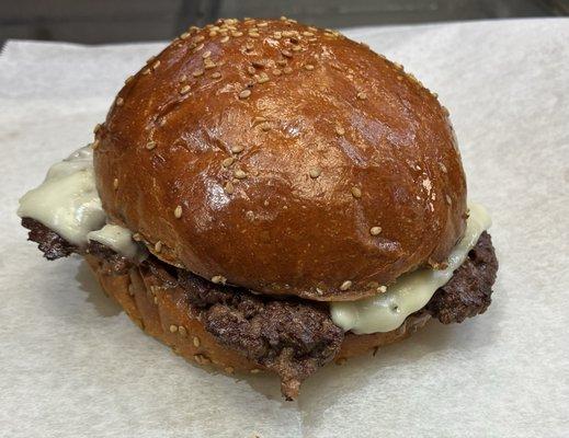 Smash Burger with Cooper Sharp cheese and Grilled Onions