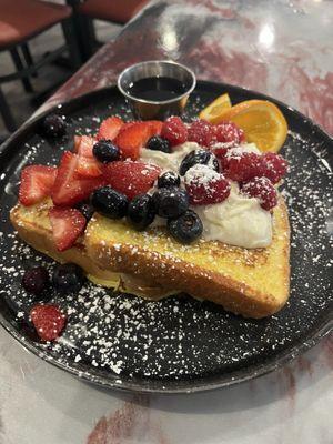 Short stack of French toast with sweet cream and fruit topping (Fiona, our waitress's suggestion!)-great